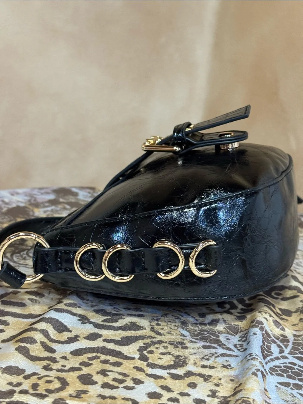 BDG Mira Belted Faux Leather Crescent Bag